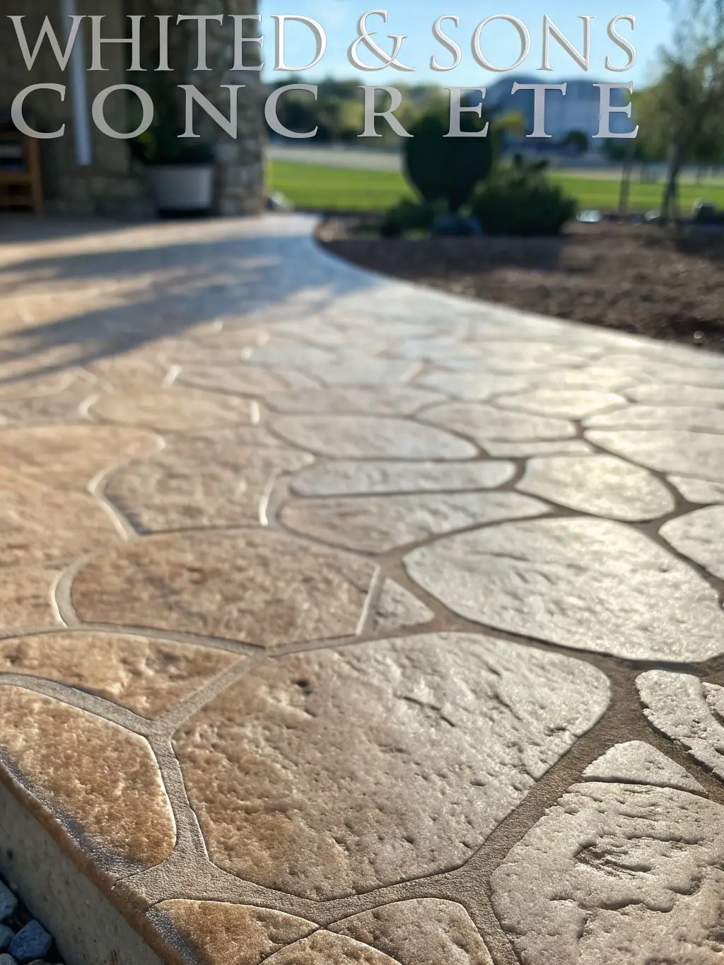 A detailed shot of decorative concrete with intricate patterns and a smooth finish, showcasing the artistry and craftsmanship of Panos Concrete Inc.'s decorative concrete services.